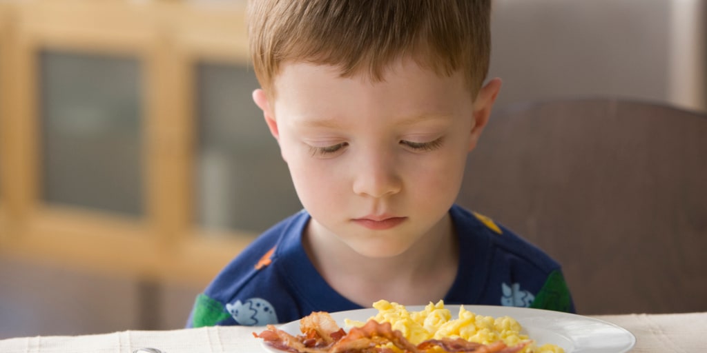 What makes kids picky eaters — and what may help them get over it